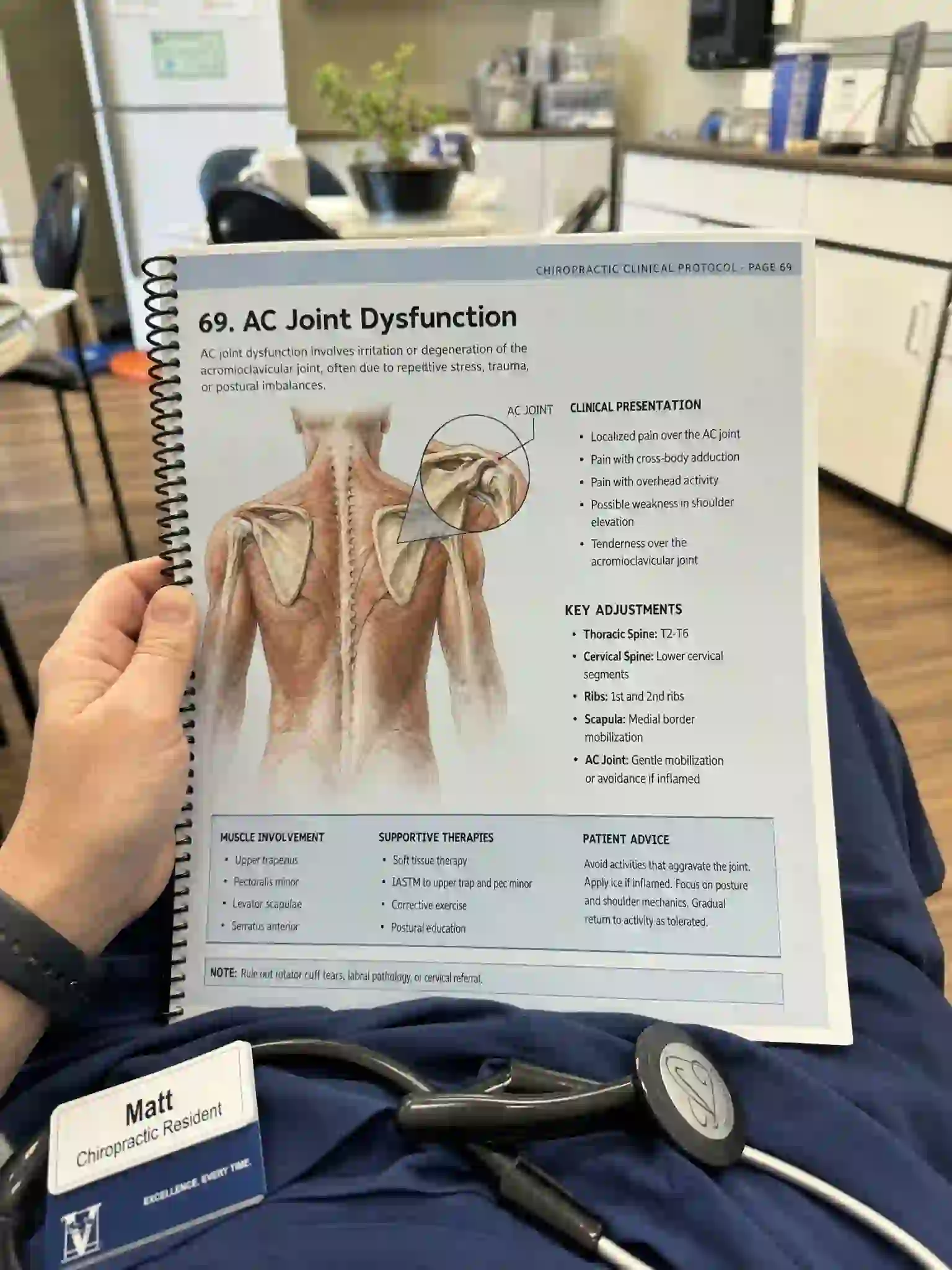 Chiropractic resident reviewing the AC Joint Dysfunction protocol page